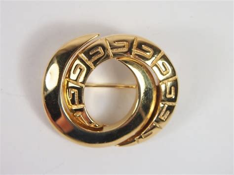 80s gold tone givenchy pin brooch